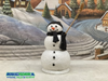 Sneeuwpop met warme sjaal